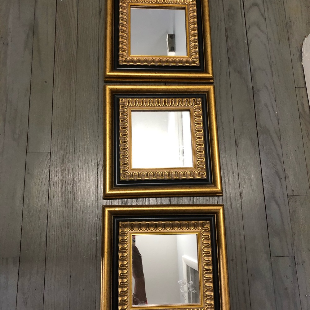 3 Black and gold mirrors
